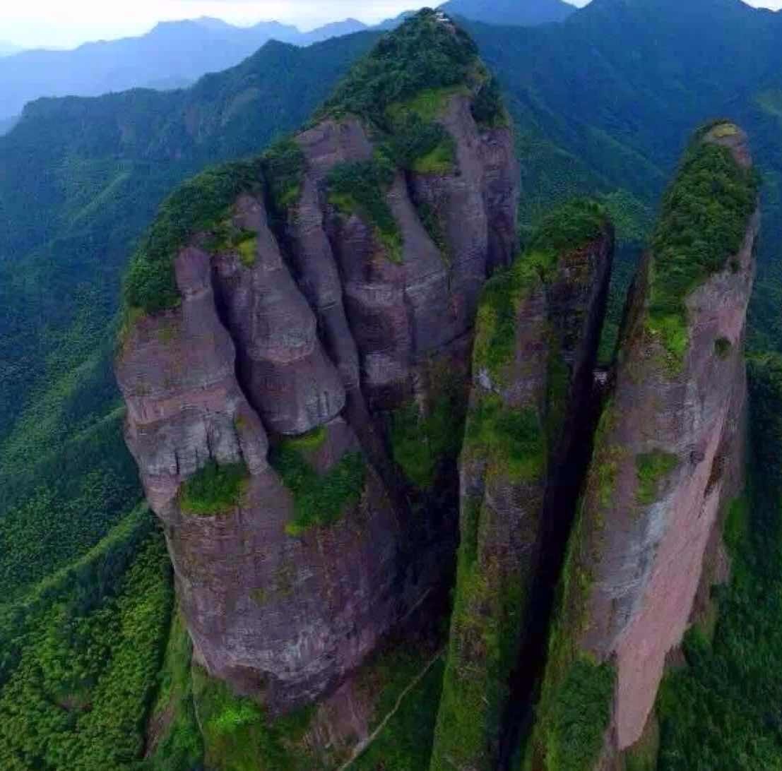 Three giant stone pillars of Mount Jianglang