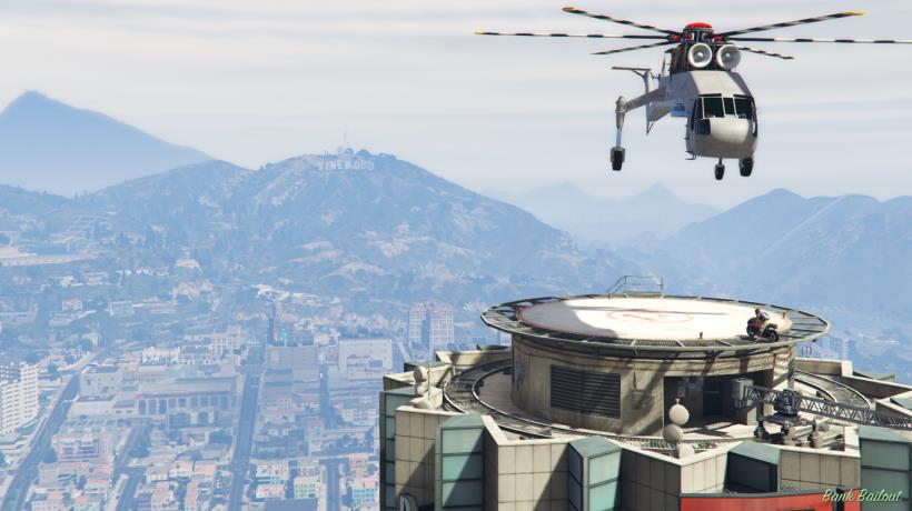 The Skylift hovers above the roof of the Maze Bank Tower