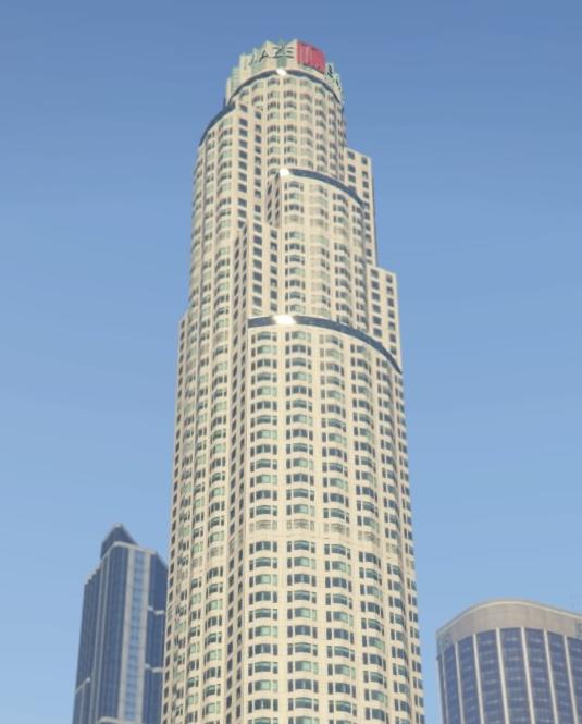 Looking up at the top of the Maze Bank Tower