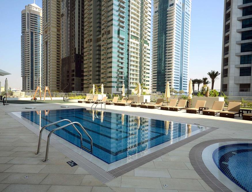 The outdoor swimming pool on the podium of the Princess Tower