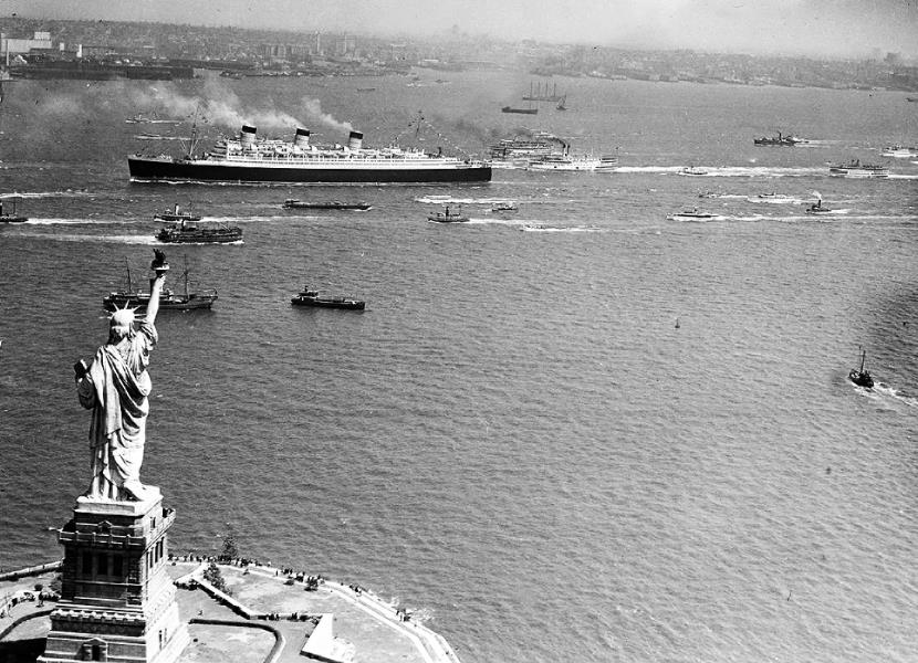 The Statue of Liberty greeting the vessels entering into the New York Harbor