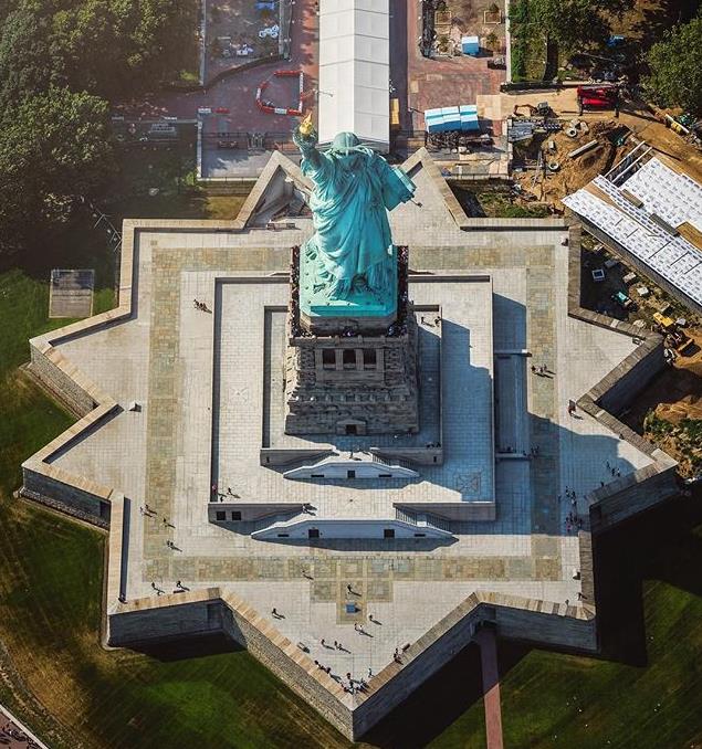 Looking down at the Statue of Liberty and its eleven-point-star base