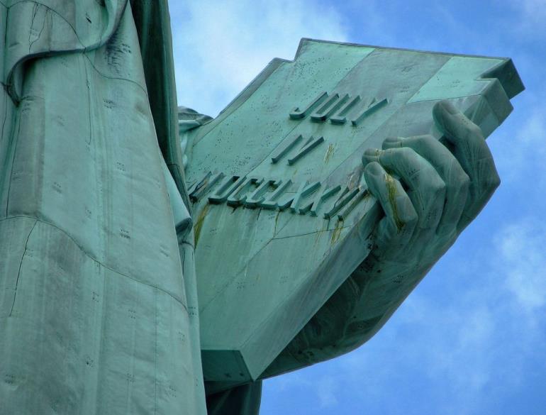 The tablet in the left hand of the Statue of Liberty