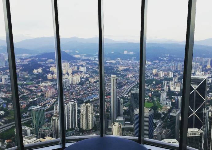 The floor-to-ceiling windows and the view seen from the observation deck on 86th floor