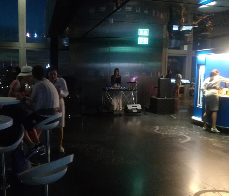 DJ playing songs in the observation hall
